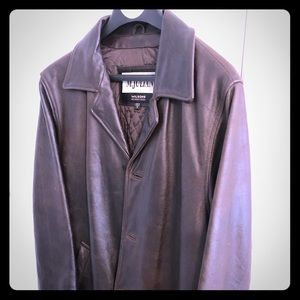 Wilson’s mid-length brown leather coat